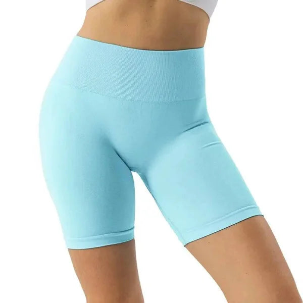 Light turquoise Nvgtn Seamless Pro spandex shorts with a high waistband for optimal comfort