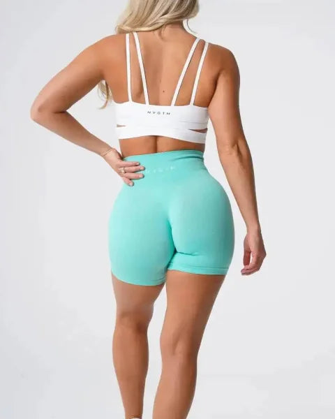 Mint green Nvgtn Seamless Pro Spandex Shorts with a high-waisted fit for optimum comfort