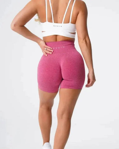 Pink high-waisted Nvgtn Seamless Pro Spandex Shorts with a fitted silhouette