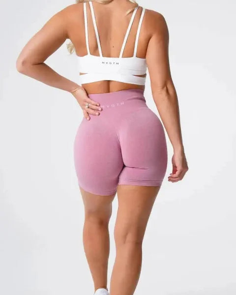 Pink high-waisted Nvgtn Seamless Pro Spandex Shorts with a fitted silhouette