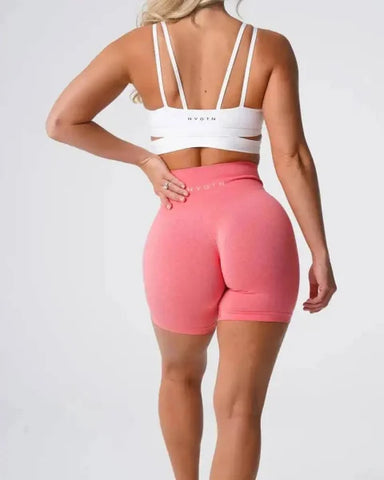 Pink Nvgtn Seamless Pro Spandex Shorts with high-waisted, form-fitting design