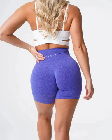 Purple Nvgtn Seamless Pro Spandex Shorts featuring a high-waisted, form-fitting design