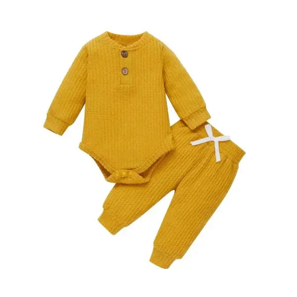 Nvgtn Seamless Pro mustard yellow ribbed baby outfit with lace-up detail