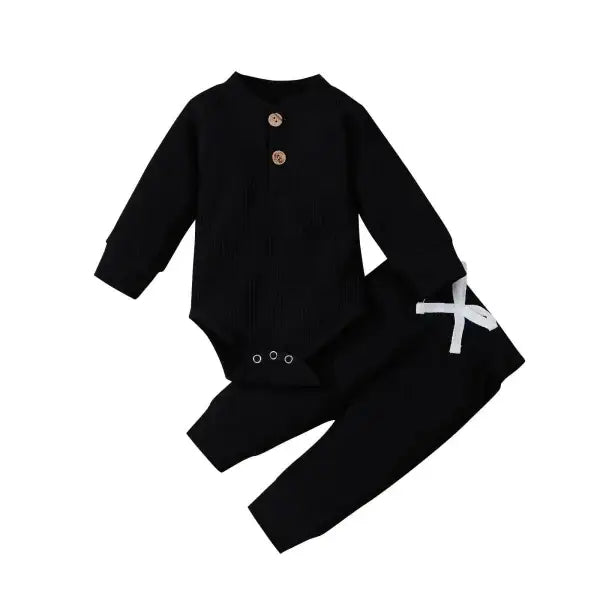 Nvgtn Seamless Pro black ribbed baby bodysuit and pants with bow