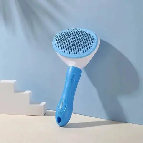 Blue and white ergonomic pet grooming brush for cats and dogs, made in China