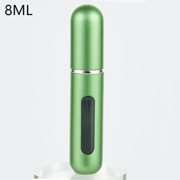 Metallic green portable perfume atomizer with viewing window, travel fragrance companion