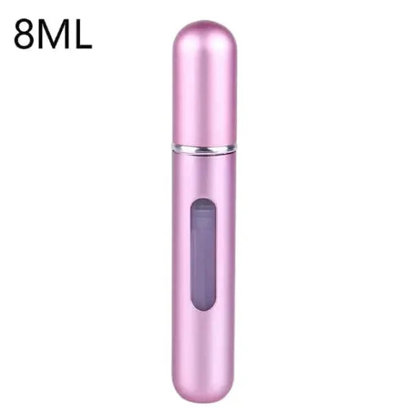 Pink metallic portable perfume atomizer with viewing window, travel fragrance companion