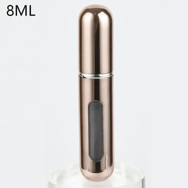 Rose gold portable perfume atomizer with viewing window for travel fragrance companion