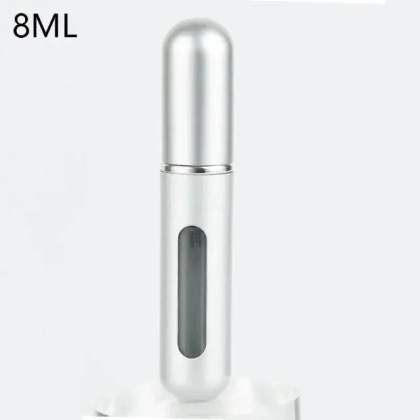 Silver portable perfume atomizer with viewing window for travel fragrance companion