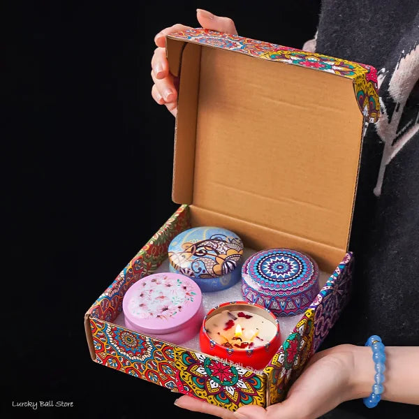 Colorfully decorated box contains four unique bath bombs in Scented Candle Gift Set