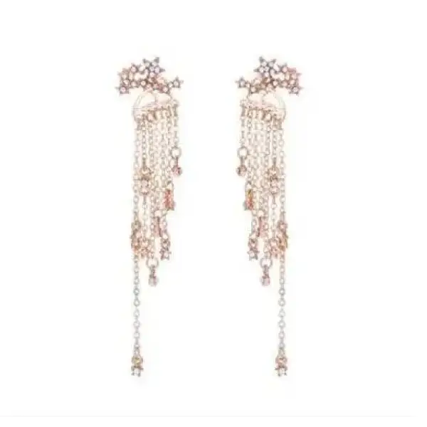 Elegant shining star tassel earrings with crystal strands and rose gold floral accents