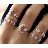 Delicate silver shining star tassel earrings with floral crystal designs