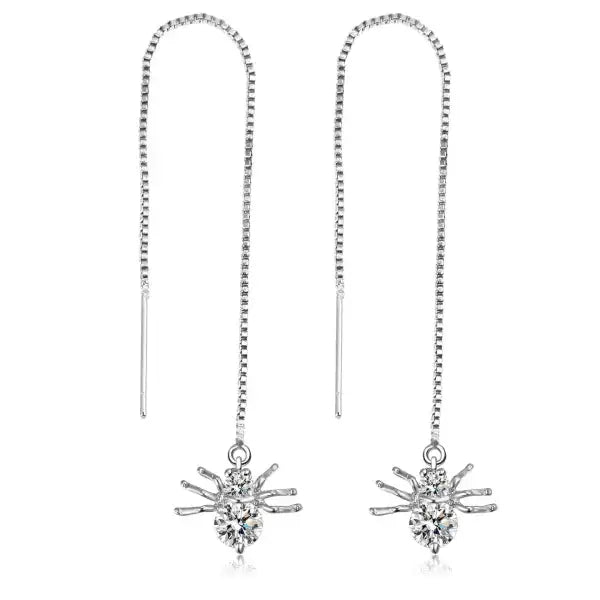 Silver star tassel earrings with crystal starburst threader design
