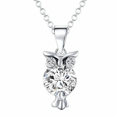 Elegant sterling silver necklace featuring a silver owl pendant with crystal accents