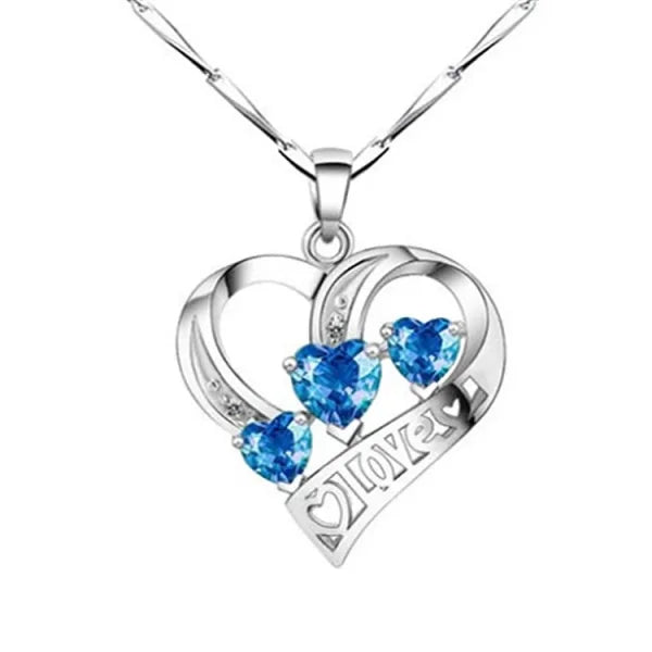 Sterling silver necklace with heart-shaped pendant and blue gemstones featuring Love text