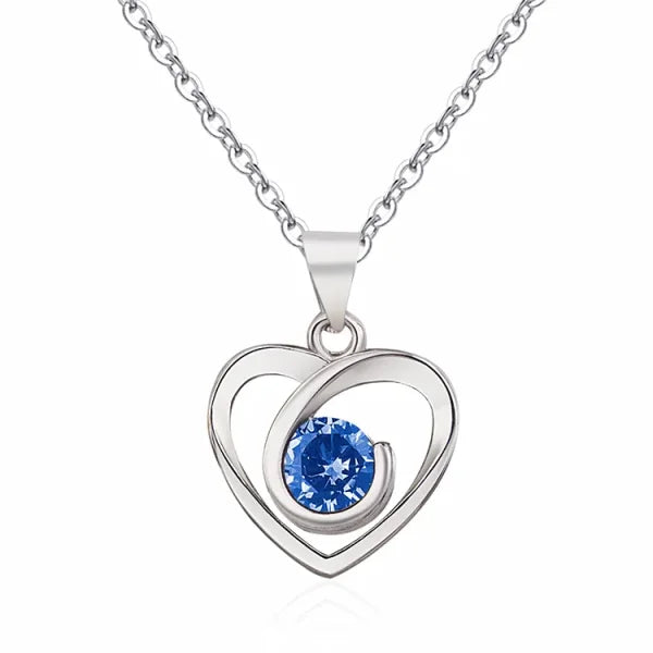 Sterling silver necklace pendant featuring a blue gemstone and GDTC certification