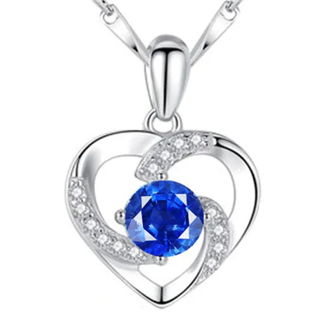 Heart-shaped silver pendant with blue sapphire and diamonds for sterling silver necklace