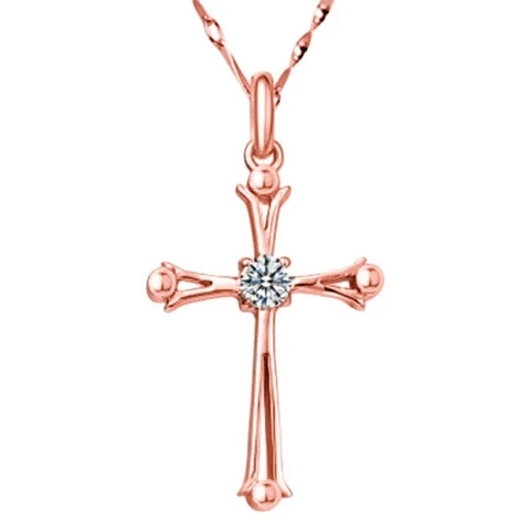 Rose gold cross pendant with diamond on a sterling silver necklace for elegant style