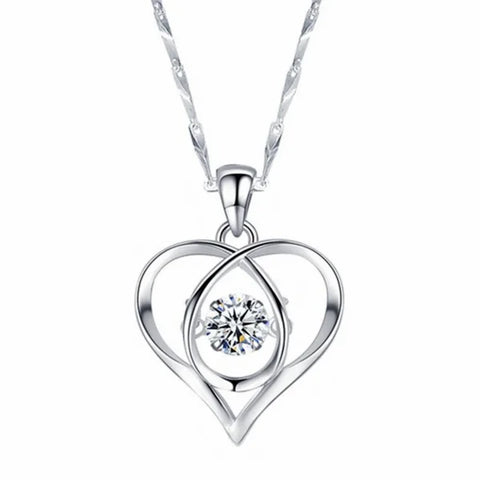 Sterling silver necklace featuring a heart-shaped pendant with a central diamond