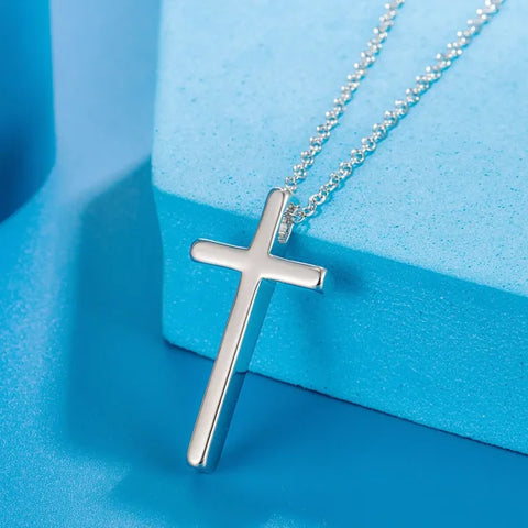 Sterling Silver Necklace featuring a cross pendant and Zircon Stone for elegant styling