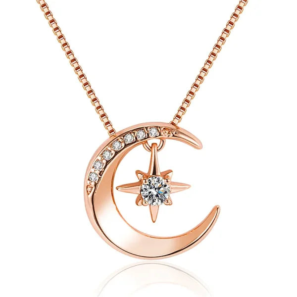 Rose gold crescent moon and star diamond pendant on a sterling silver necklace