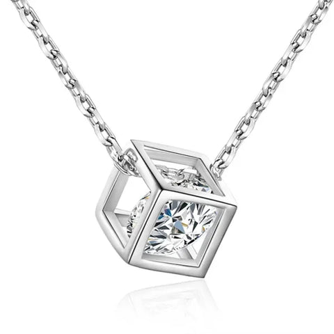 Sterling silver necklace pendant showcasing a cubic design with an inset crystal