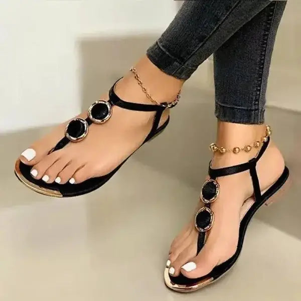 Stylish black and gold T-strap flat summer sandals for women