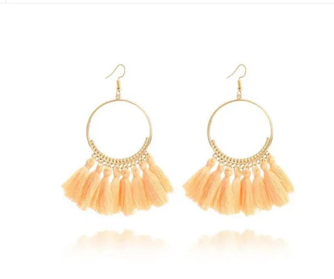 Stylish round drop dangle earrings with gold hoops and peach-colored tassels