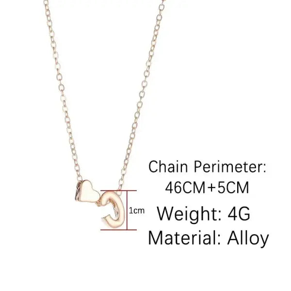 Initial necklace with dainty heart pendant