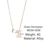 Initial necklace with dainty heart pendant