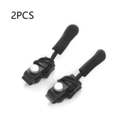 Two black plastic clips with foam handles for zipper repair in Universal Tool-free Zipper Head Repair Device