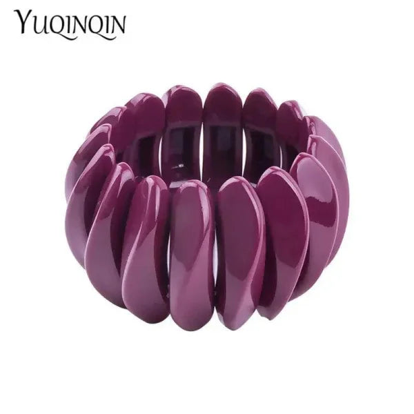 Purple elastic vintage cuff bracelet made of curved plastic segments for women’s fashion