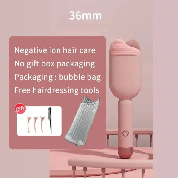 Pink handheld ionic hair dryer with styling accessories for effortless beach waves