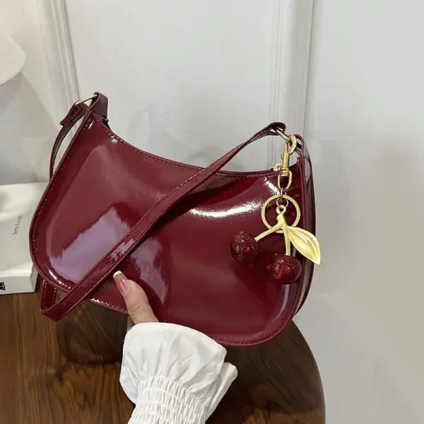 Women’s PU Leather Handbag Versatile Fashion Solid Color Cherry Pendant Shoulder Bag Casual Commuting Bag Girl Underarm