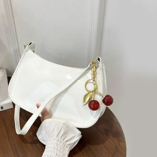 Women’s PU Leather Handbag Versatile Fashion Solid Color Cherry Pendant Shoulder Bag Casual Commuting Bag Girl Underarm